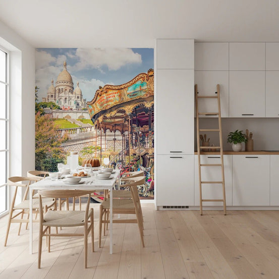 Montmartre Melody wallpaper mural of Sacre-Coeur and a vintage carousel behind a marble dining table in a white kitchen