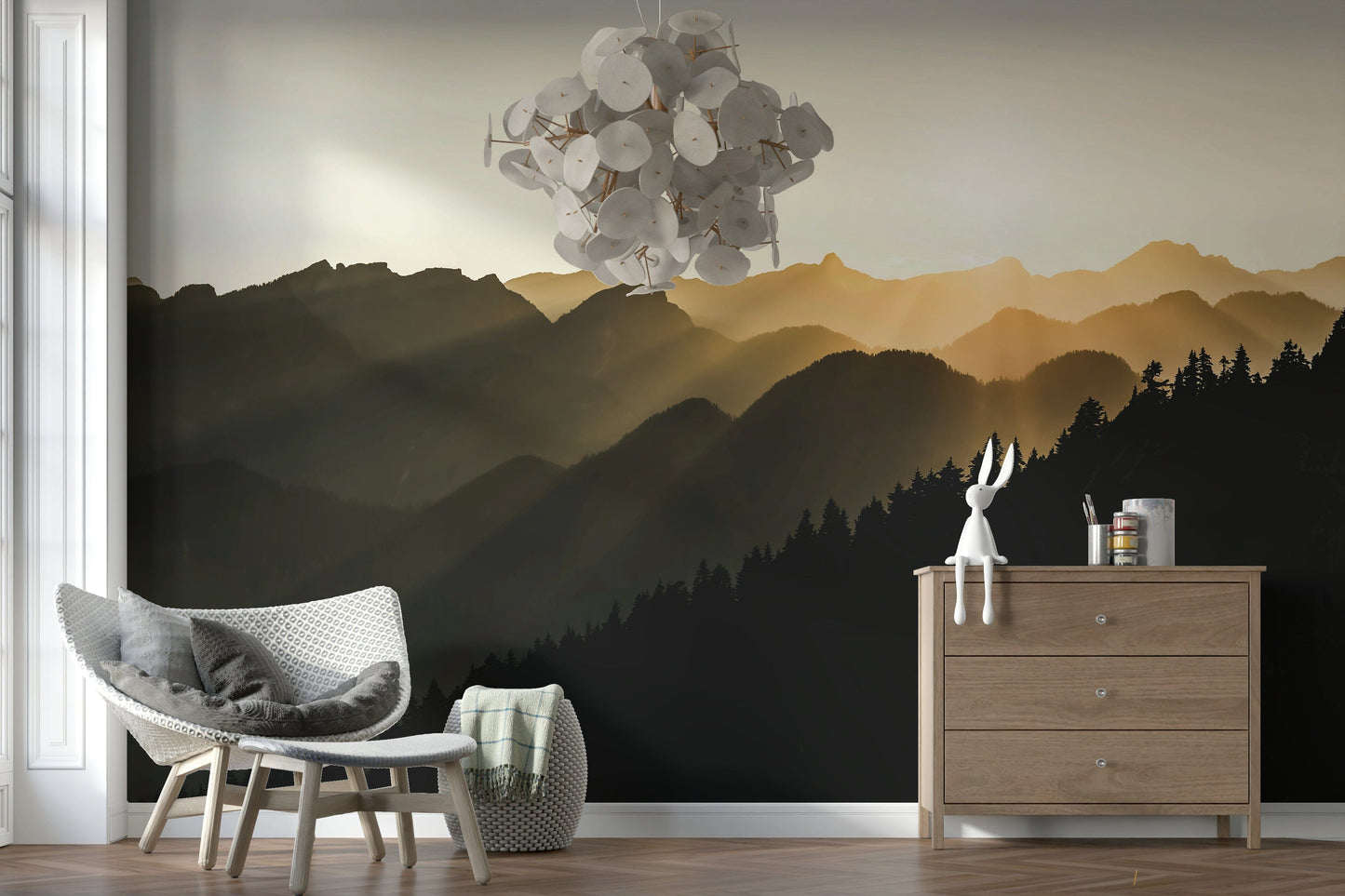 Dramatic wall mural illustrating golden sunrise over forested mountain ridges.