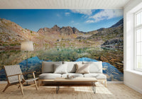 Calm blue sky views on Mountain Lake Serenity wallpaper.