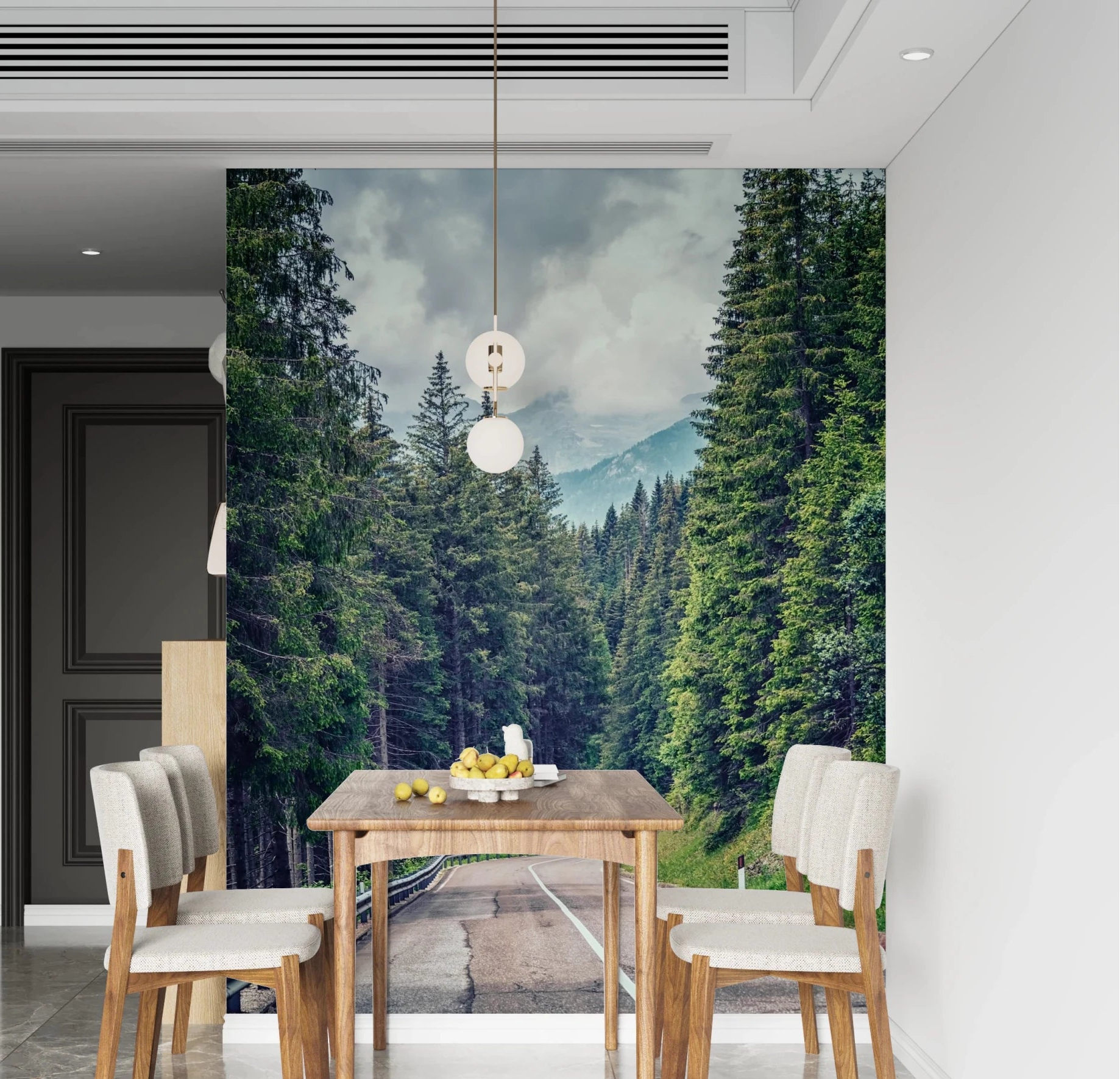 Mountain Road Vista wallpaper mural of a forest road toward misty peaks behind a wood dining table in a dining room