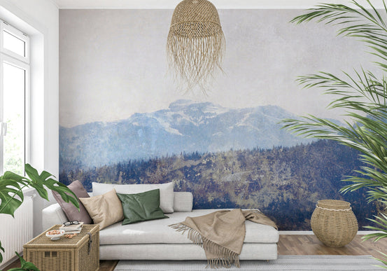 Mountain Vista Texture wallpaper mural of faded blue mountains behind a white daybed sofa and woven pendant in a living room