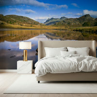 Scenic hills wall mural with calm water view