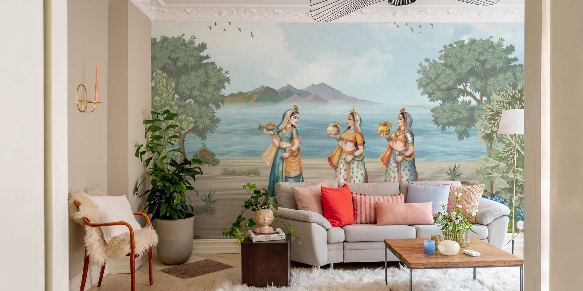 Traditional Rajasthani women mural with scenic backdrop
