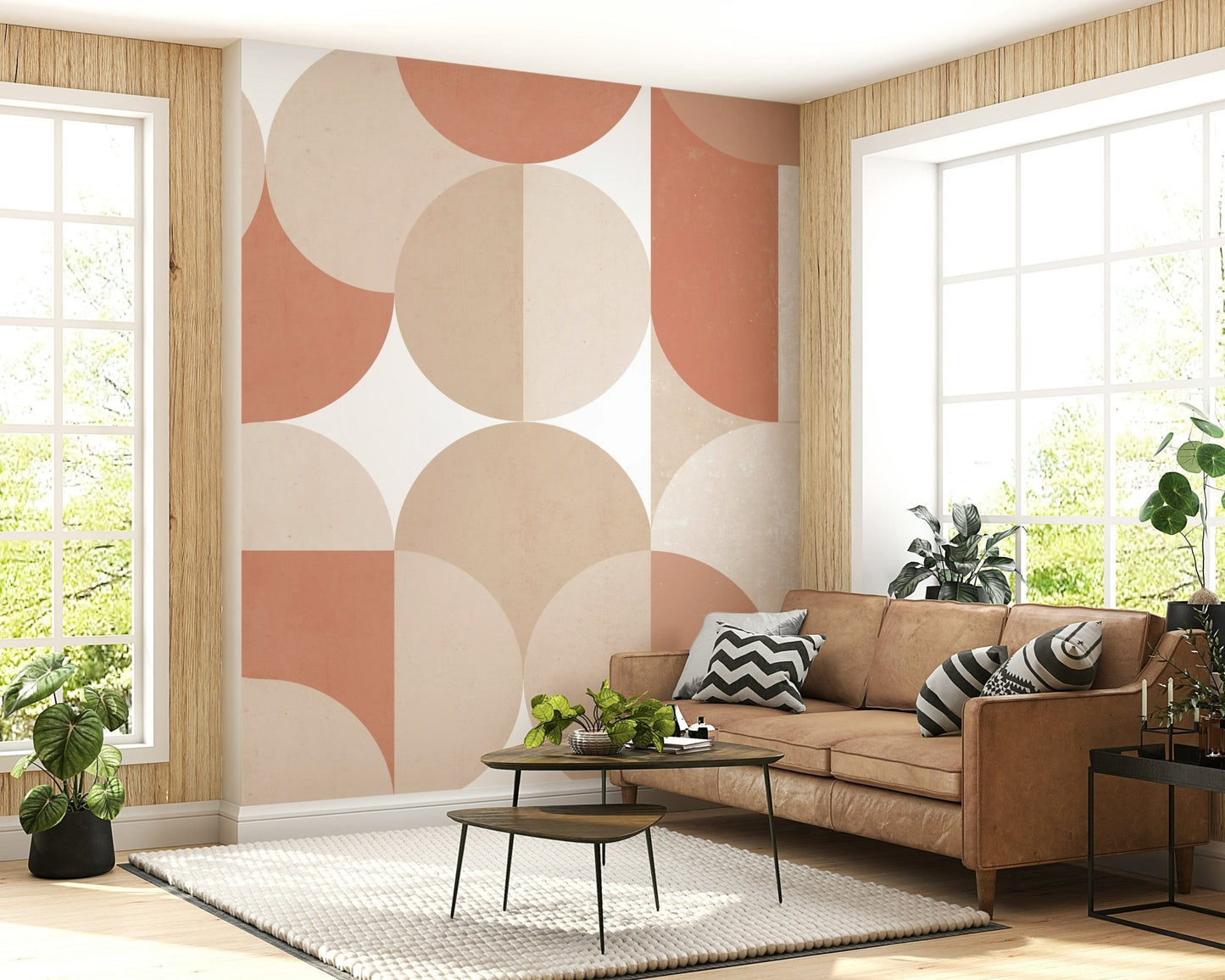 Decorative wall mural with abstract circular patterns in muted earthy colors.