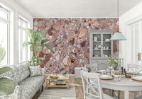 Natural Terrazzo Wallpaper surface with rose-pink aggregate finish.