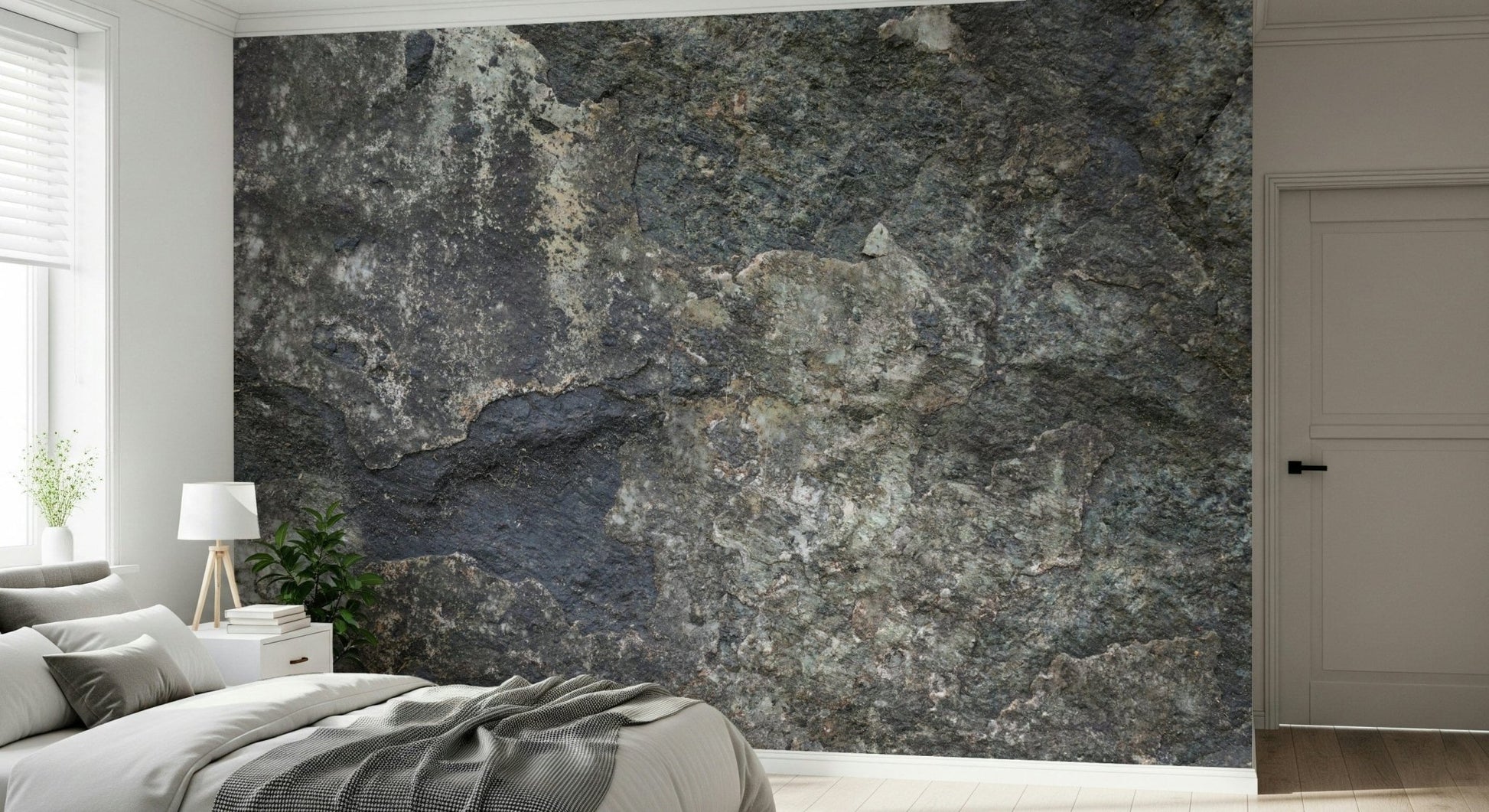 Stone-look wall mural in dining area, modern chairs and neutral wall decor styling
