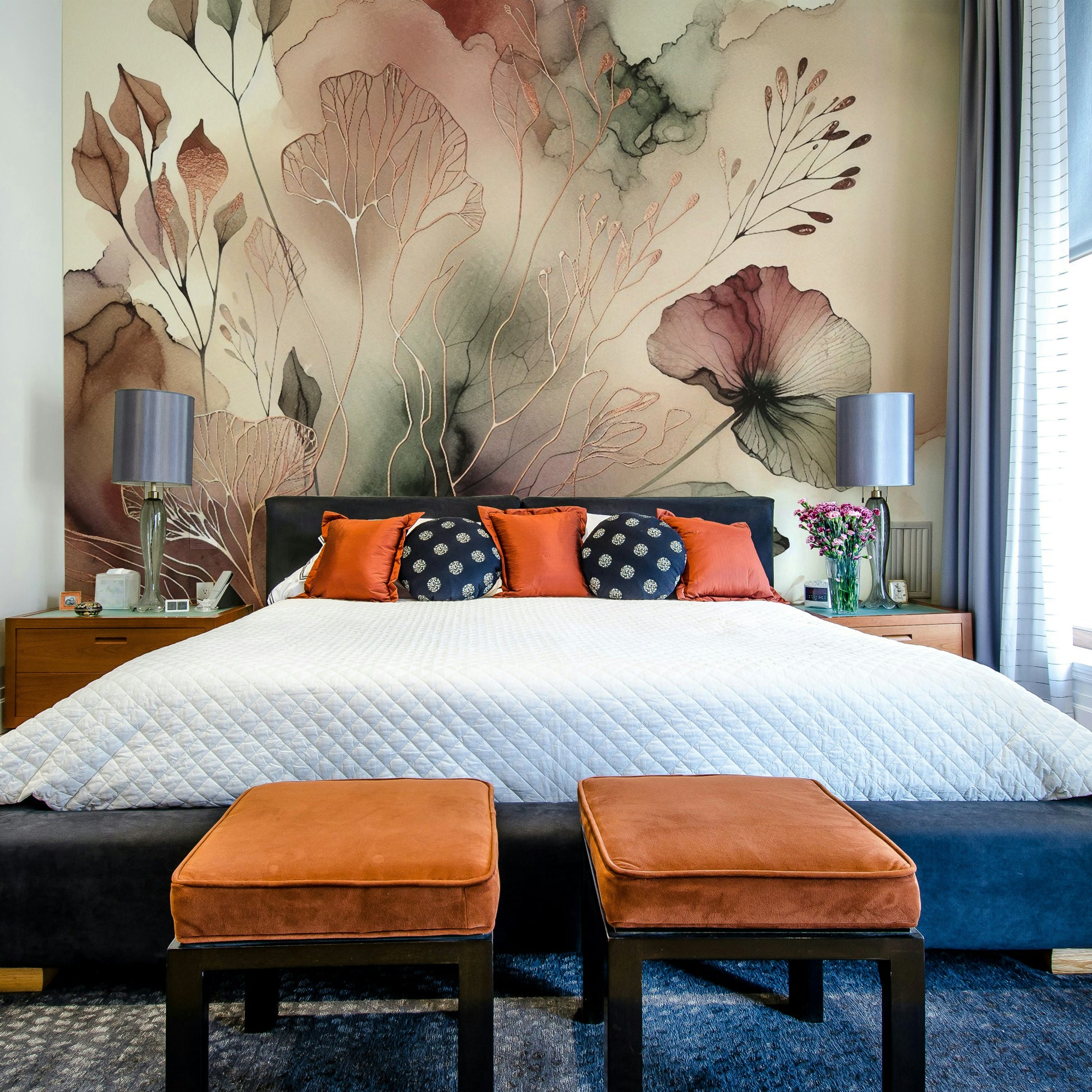 Artistic branch pattern wallpaper in a guest room with natural lighting.