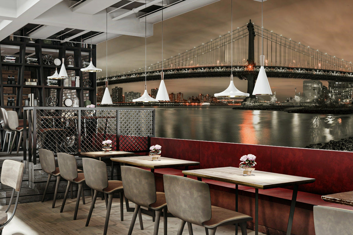 Urban Crossing wallpaper mural of a sepia Manhattan Bridge at night behind a red banquette in a restaurant