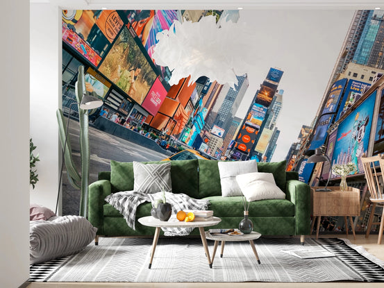 NYC Buzz wallpaper mural of Times Square billboards and skyscrapers behind a green velvet sofa in a living room