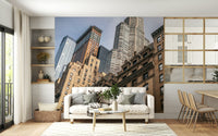 Diverse NYC architecture wallpaper for walls, geometric shapes, cloudy background.