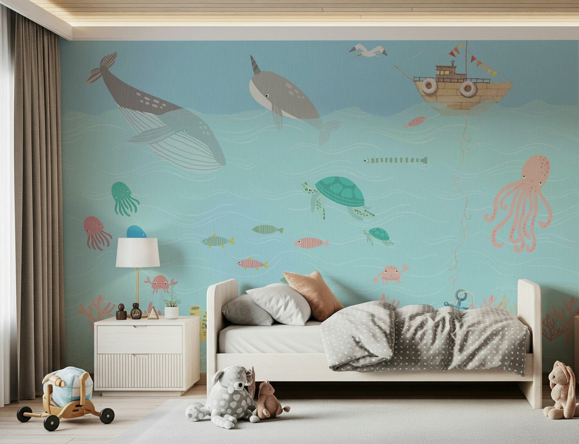 Playroom feature wall mural with ocean animals, soft color gradients, bright and tidy room setup