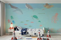 Kids playroom wallpaper mural with smiling whales and fish, pastel color tones, modern decor