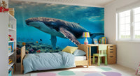 Deep sea blue color palette mural behind a modern living room sofa.