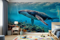 Calm ocean waves and whales for a modern nursery wall decor setup.