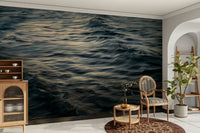 A minimalist interior with the ocean-themed wallpaper.

