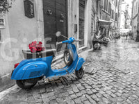 The image captures the unique style of a vintage scooter.

