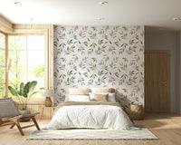 Decorative wall mural with watercolor-style olive leaves and fruit in soft green tones.