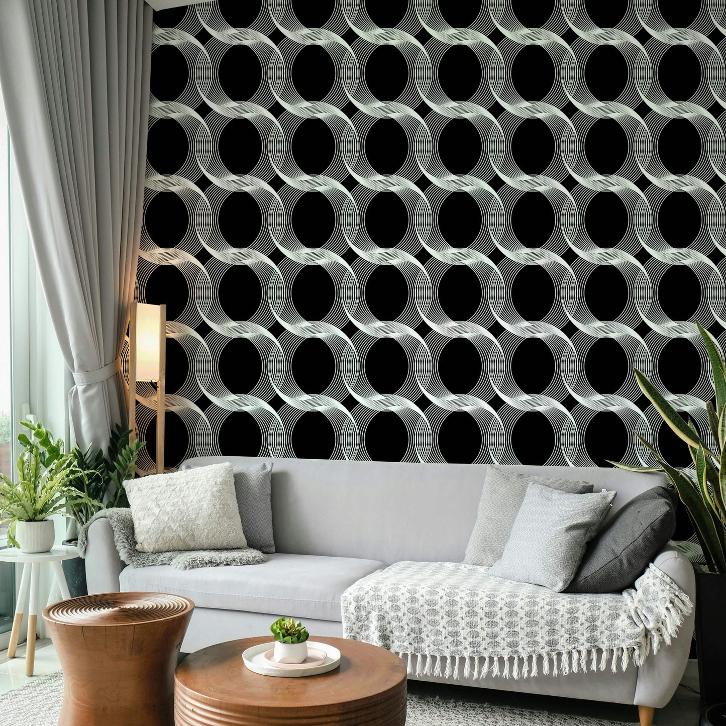 A modern living room with a geometric wall mural

