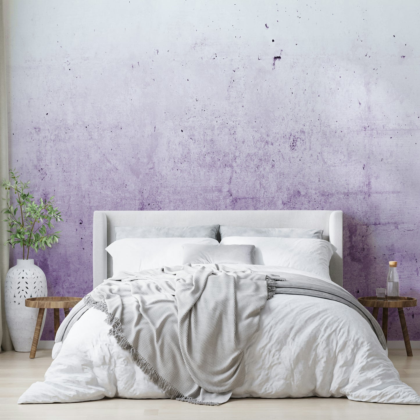Wall mural with a radiant orchid ombre on a concrete texture.

