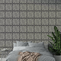 Taupe-toned ferns on soft natural background

