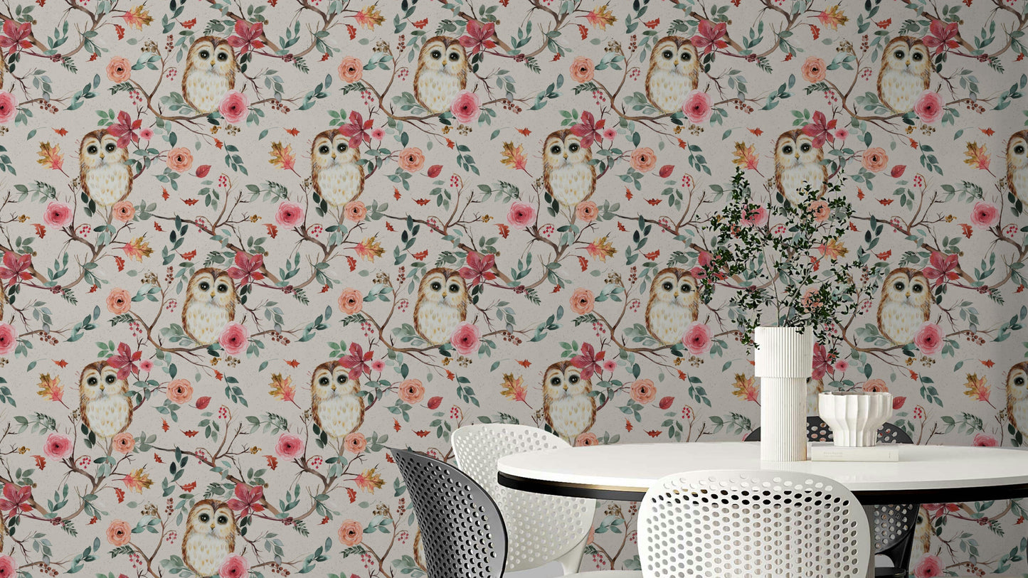 Owl perched on tree branch with green and red leaves wallpaper

