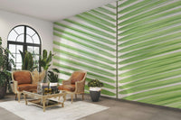 Minimalist palm frond mural with calming tones

