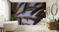 Wall mural featuring palms against soft skies, evoking serenity and tropical charm.