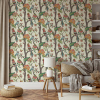 Tropical wallpaper mural featuring perched birds, lush foliage, and bright blossoms.