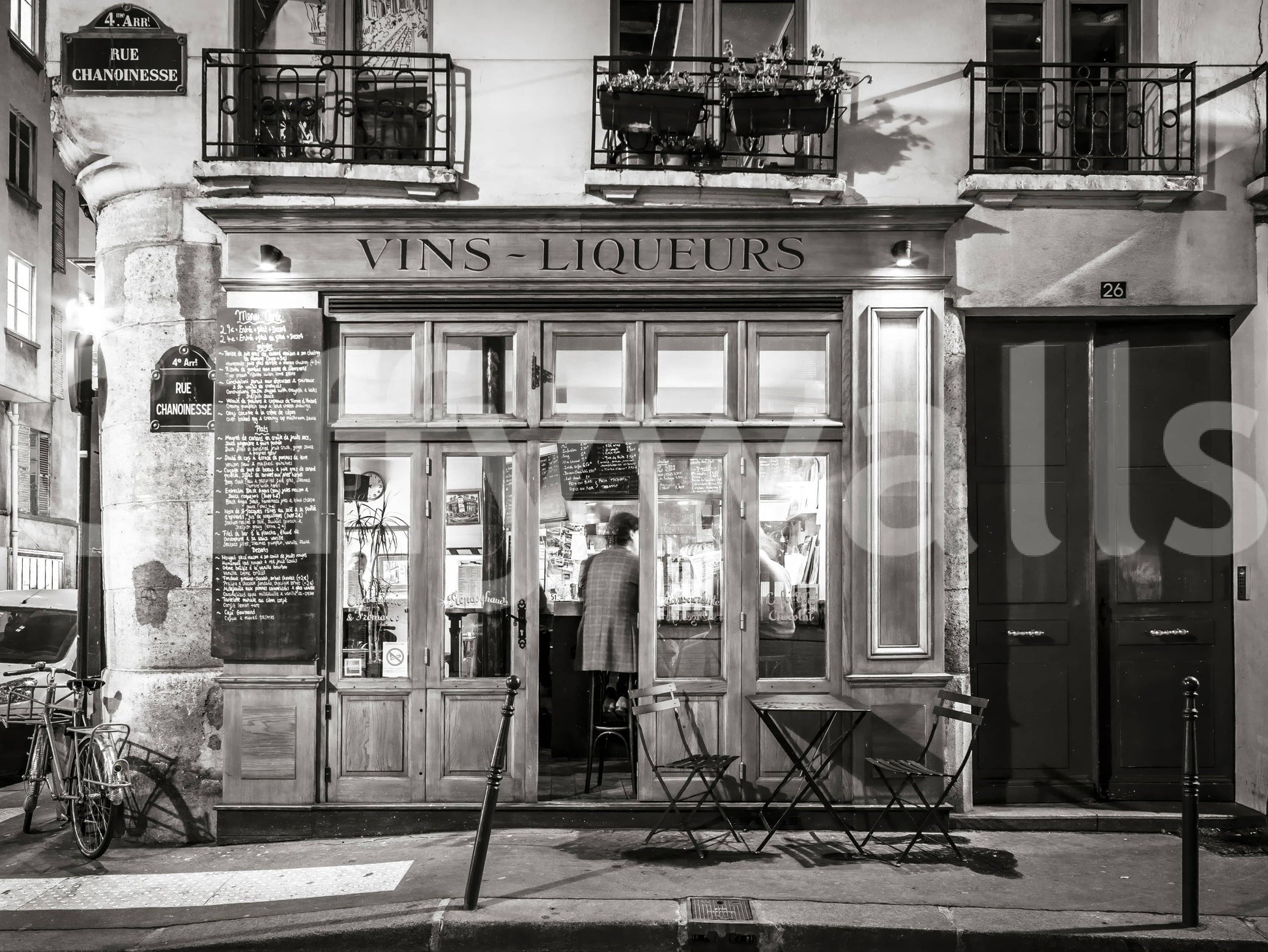 Retro street life depiction wallpaper, dark and moody atmosphere.