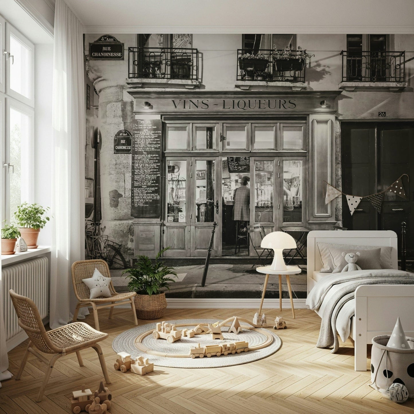 Authentic bistro windows and balconies above the shop mural.