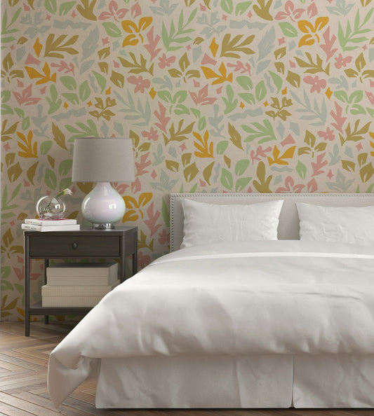 A full-wall mural showing a pattern of abstract shapes.
