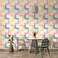 Mid-century modern boomerang pattern wallpaper in calming pastel tones.

