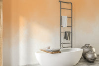 Soft watercolor wash wallpaper for elegant bathroom interiors.