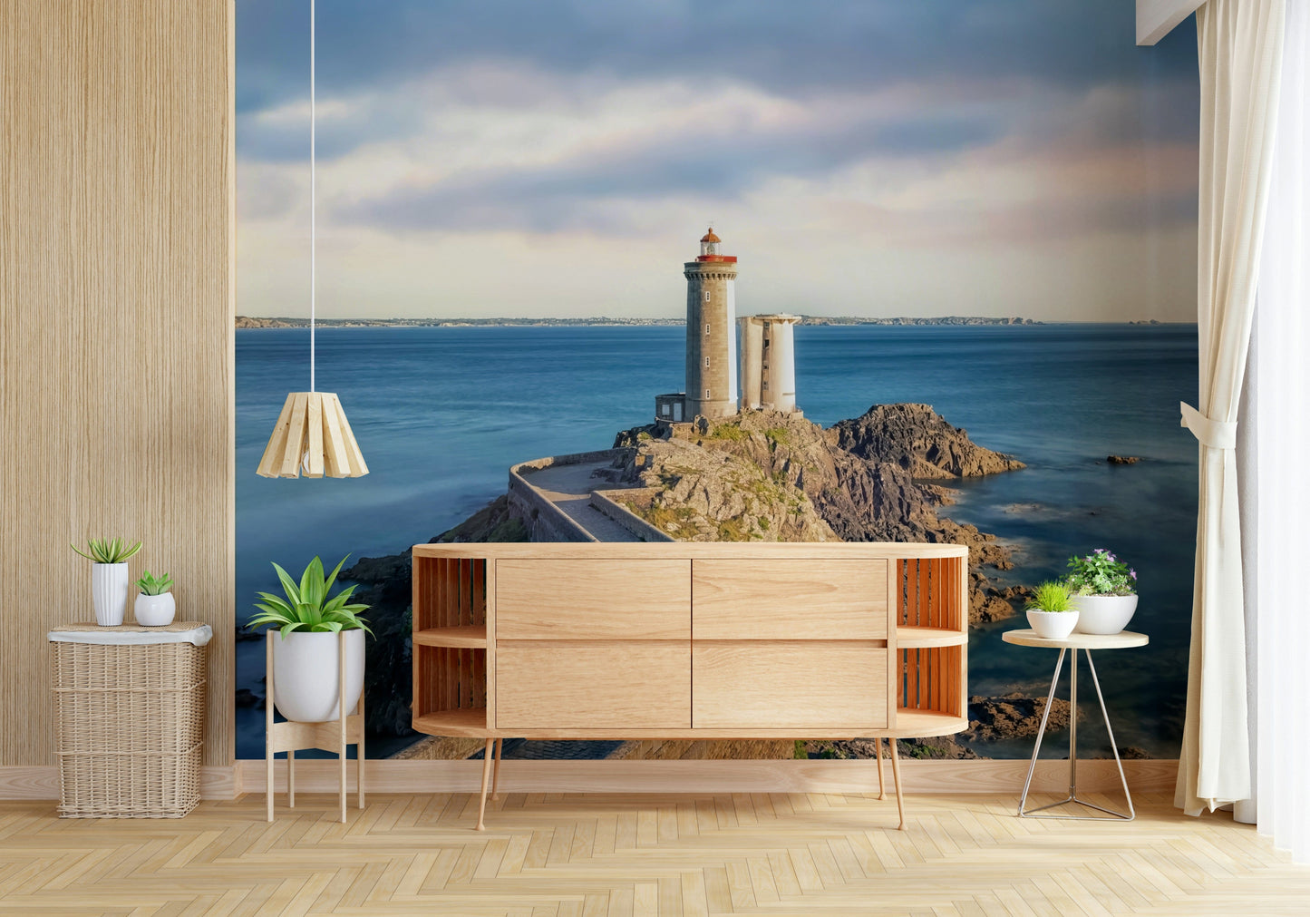 Petit Minou Lighthouse wall mural behind sofa in airy apartment lounge