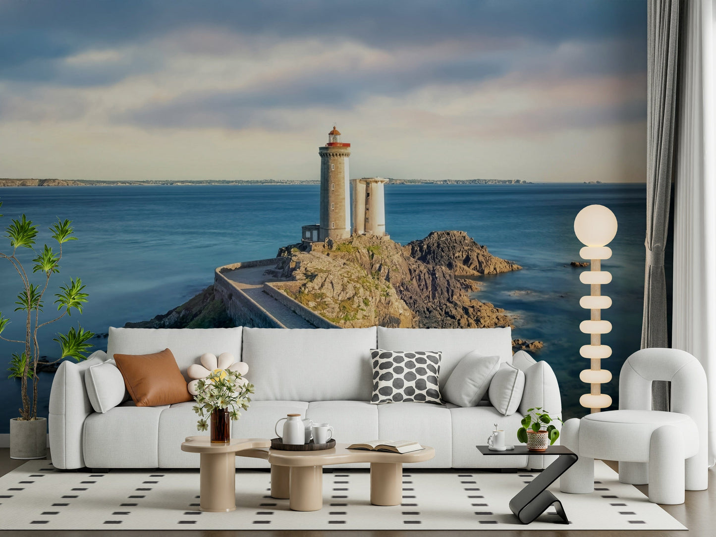 Seaside lighthouse mural above console table in entryway, muted colors