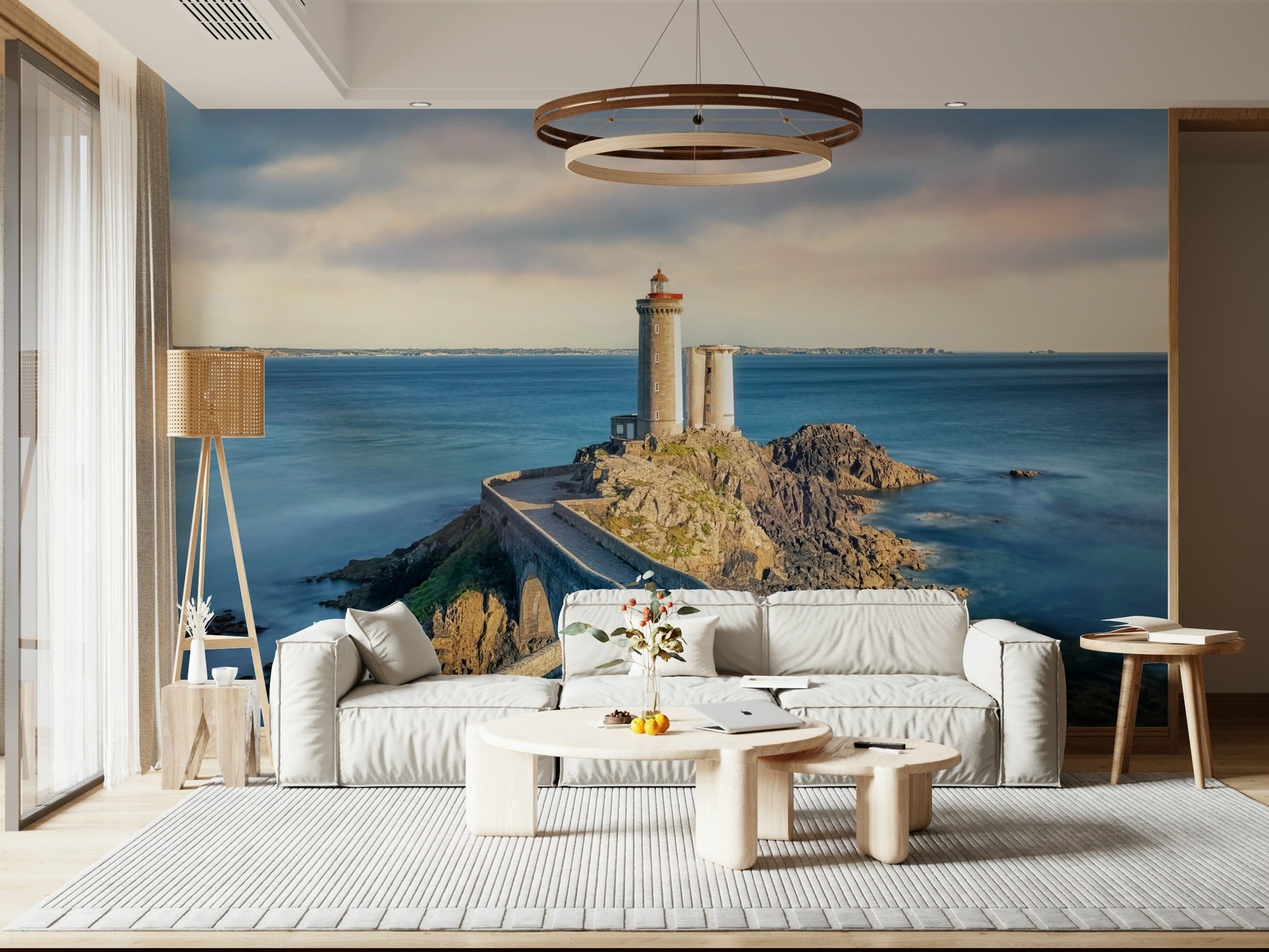 Coastal lighthouse mural in modern living room, soft blue-gray tones
