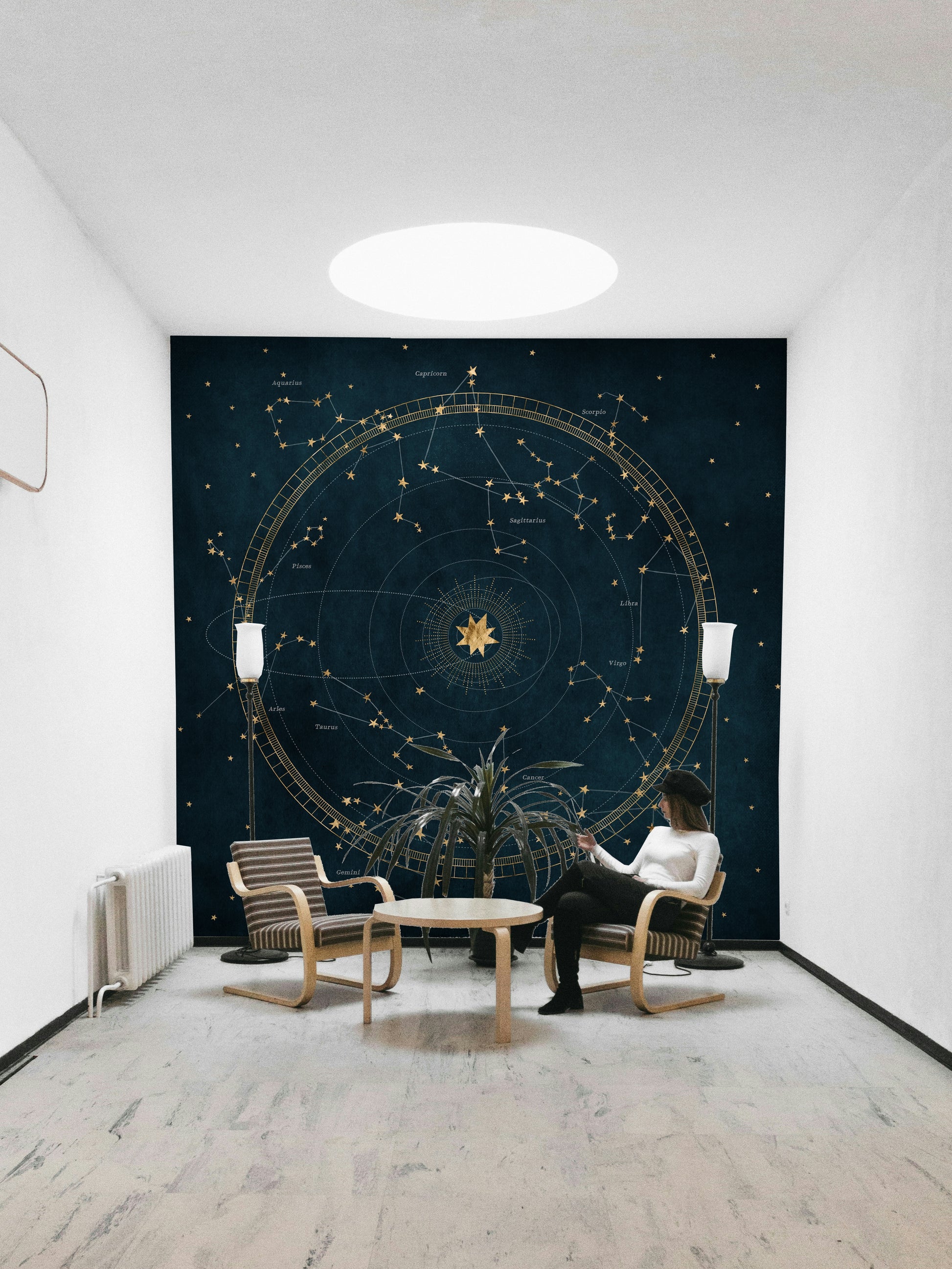 Unique celestial wall mural featuring astro wheel in petrol blue.

