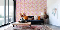 Graphic Pineapple Paradise hallway wallpaper in yellow and pink.