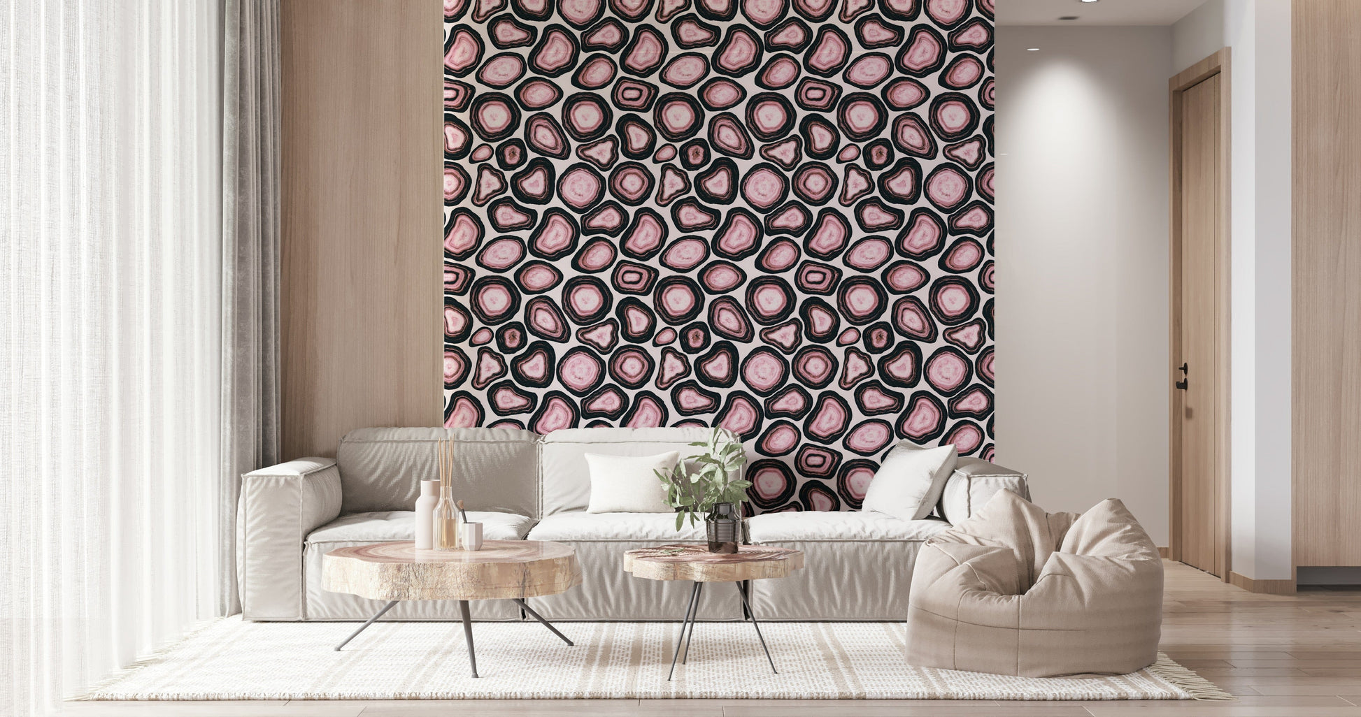 Soft pink agate motifs layered with darker edges forming a striking organic wallpaper.