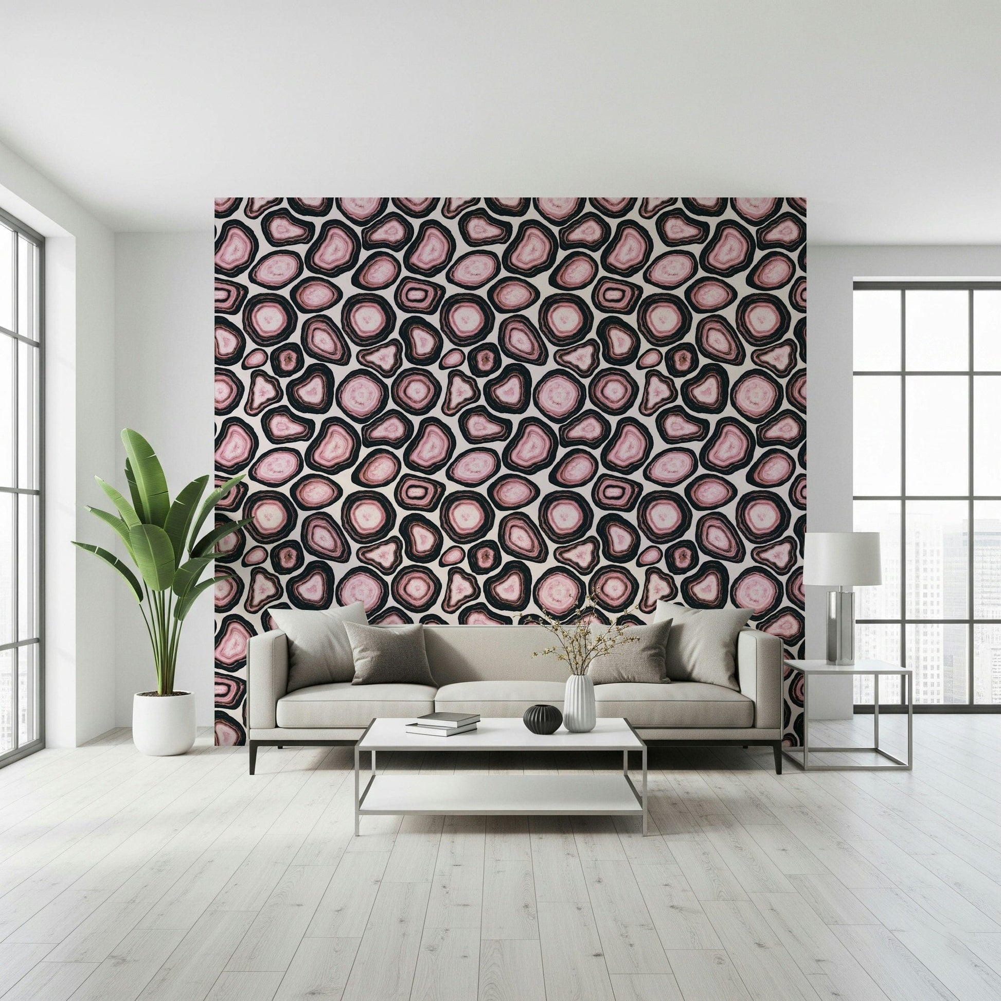 A pink agate wallpaper featuring layered stone-like patterns with rich mineral textures.