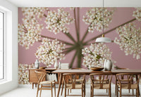 Soft pink feature wall design with radial flower patterns for the bedroom.