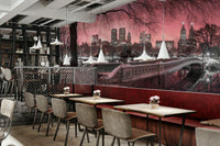 Hotel lobby room with a pink city park scene.

