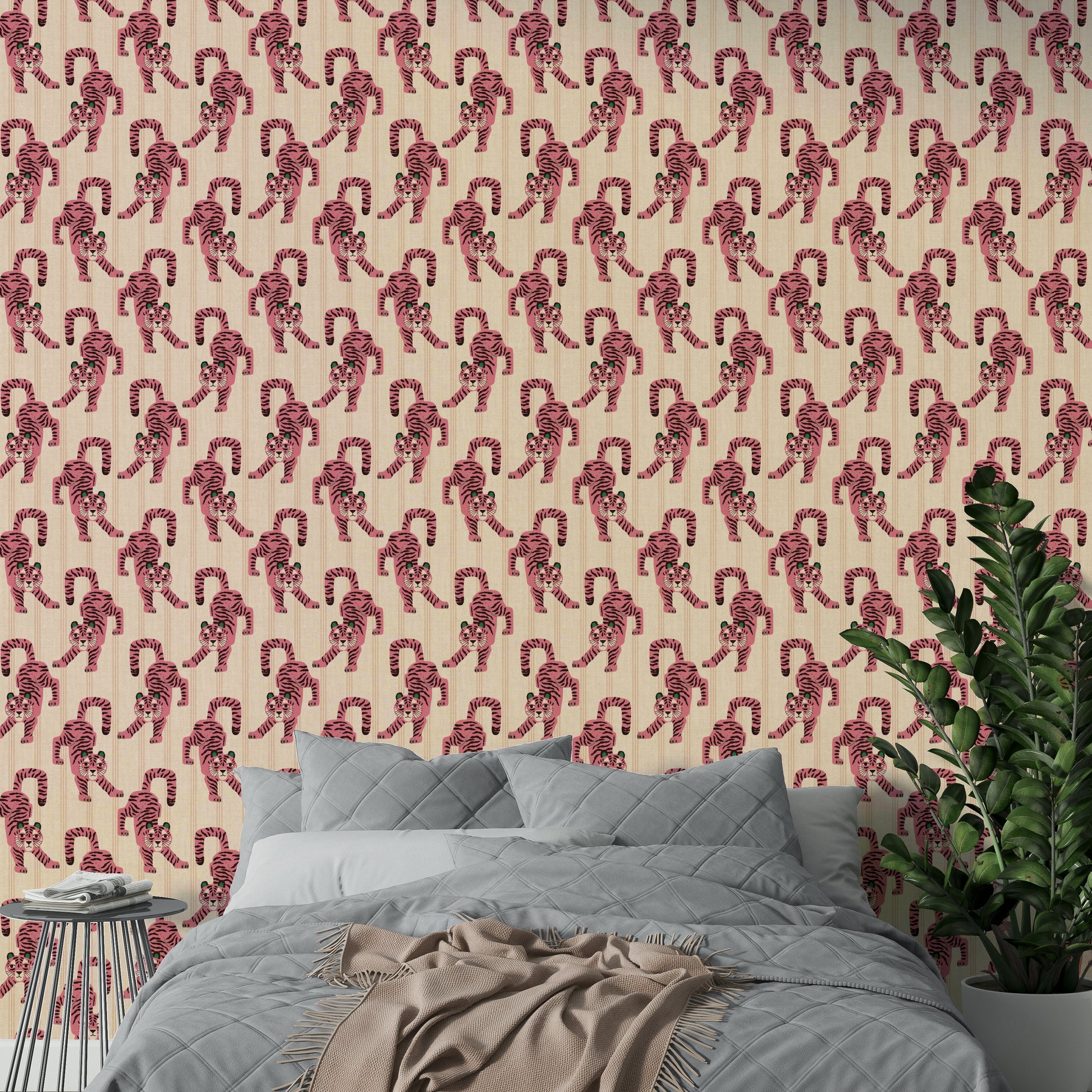 Playful pink jumping tiger wallpaper with jewel jungle design

