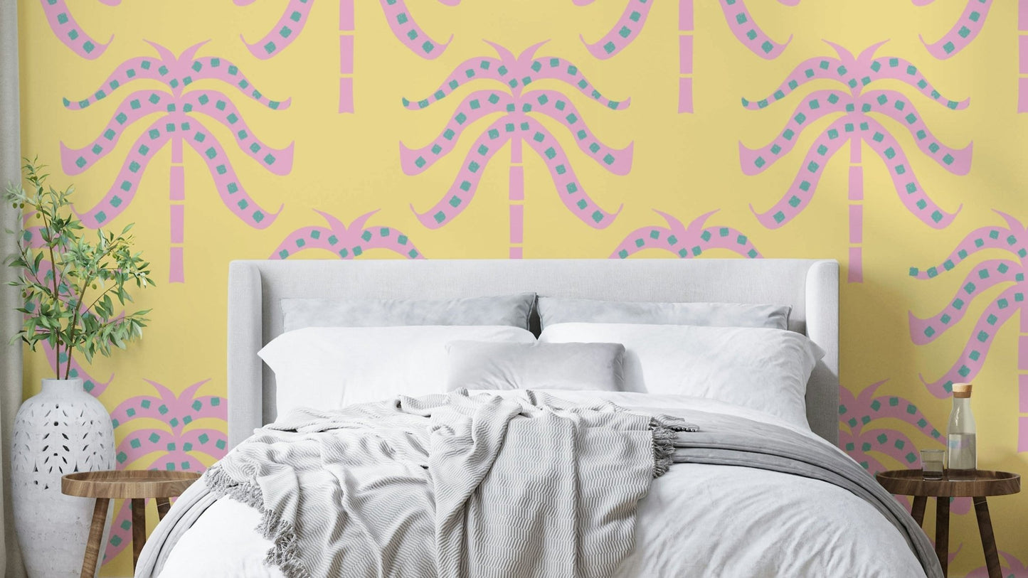 A wall mural of a tropical palm leaf pattern.

