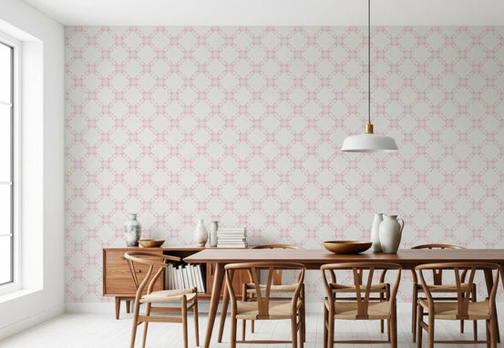 Pink Petal Lattice wallpaper behind a walnut dining table and wishbone chairs under a white dome pendant