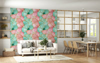 Luxurious wall covering with gilded gold details over pink and turquoise waves