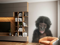 Smiling baby monkey mural for toddlers’ space

