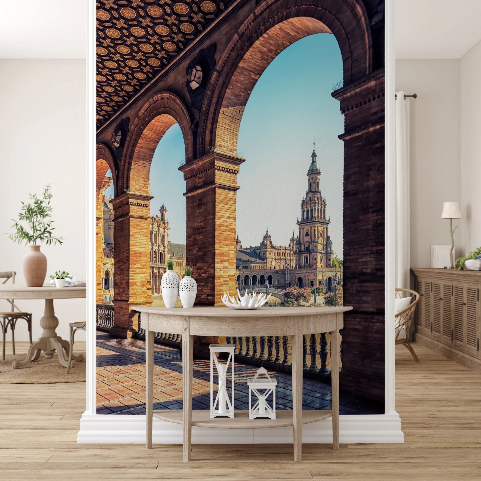 Plaza de España View wallpaper mural of the arched colonnade and plaza above a pale wood console in an entryway