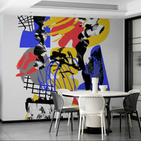 Angular shapes and vibrant colors creating a striking wall mural

