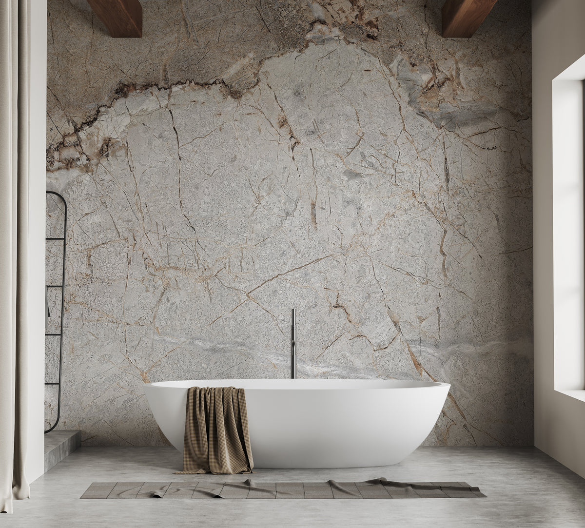Elegant Gray Marble wallpaper mural with gold veining in a bathroom behind a freestanding white bathtub and towel ladder